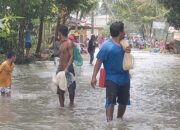 Menjala Ikan Saat Banjir Musiman Rendam Jalan Cijoho – Cijalu Parigi